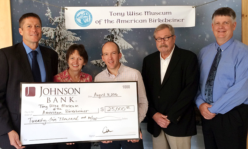Representatives from Johnson Bank present a check for $25,000 to the ABSF for the Tony Wise Museum of the American Birkebeiner.  L-R, Craig Hokanson, Regional President, Johnson Bank; Allison Slavick, Museum Planner; Ben Popp, Executive Director, ABSF; Walt Jaeger, retired Regional President of Johnson Bank; Todd Knutson, President, Johnson Bank Hayward.