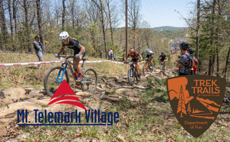 Mountain bikers racing up a hill